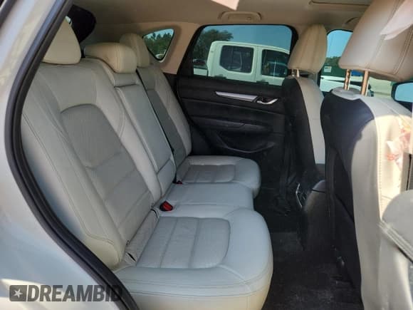 ✅ 2021 Mazda CX-5 Touring • VIN: JM3KFACM9M0418579 • Лот: 89574895. Опубликован ранее на Copart с пробегом 63 678 миль. Бесплатный доступ к архиву аукционных продаж из США и подробный отчёт об истории автомобиля на DreamBid. Изображение 11.