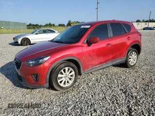 ✅ 2014 Mazda CX-5 Sport • VIN: JM3KE2BE8E0367953 • Lot: 65354735. Listed on Copart with 174,390 mi. Free auction sales archive from the USA and detailed vehicle history report at DreamBid. Image 1.
