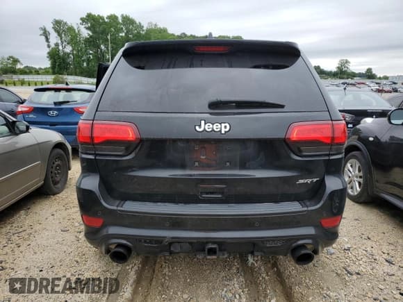 ✅ 2017 Jeep Grand Cherokee • VIN: NCS108376 • Lot: 57158405. Listed on Copart with 101,442 mi. Free auction sales archive from the USA and detailed vehicle history report at DreamBid. Image 6.