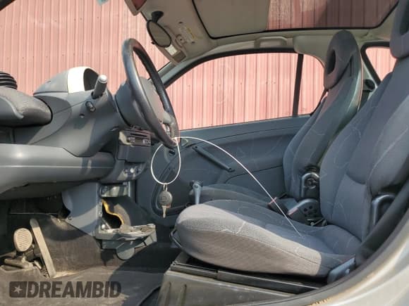 ✅ 2006 Smart fortwo • VIN: WMEAJ00F56J262624 • Лот: 67174405. Опубликован ранее на Copart с пробегом 125 366 миль. Бесплатный доступ к архиву аукционных продаж из США и подробный отчёт об истории автомобиля на DreamBid. Изображение 7.