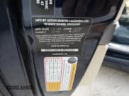 ✅ 2009 Aston Martin DB9 • VIN: SCFAD01E79GA12139 • Lot: 76241164. Wystawiony na Copart z przebiegiem Nie podano. Bezpłatny archiwum sprzedaży aukcyjnych z USA i szczegółowy raport historii pojazdu na DreamBid. Zdjęcie 13.