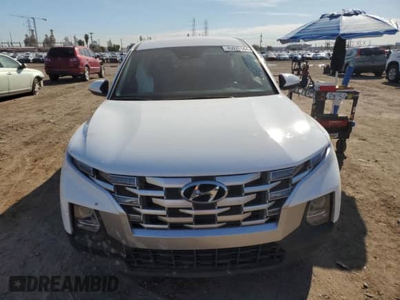 2023 Hyundai Santa Cruz SE с VIN 5NTJA4AE2PH069127, выставлен на аукционе Copart как лот 88811635 с пробегом Не указан миль и Списание • Salvage title. История ставок и продаж доступна на DreamBid. Изображение 5.