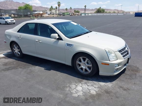 ✅ 2010 Cadillac STS AWD • VIN: 1G6DU6EV5A0147190 • Lot: 42432227. Wystawiony na IAAI z przebiegiem 132 965 mil. Bezpłatny archiwum sprzedaży aukcyjnych z USA i szczegółowy raport historii pojazdu na DreamBid. Zdjęcie 1.