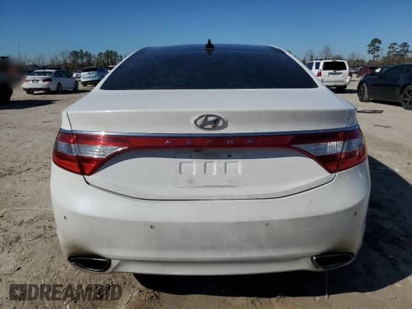 2013 Hyundai Azera с VIN KMHFH4JG3DA224834, выставлен на аукционе Copart как лот 42103125 с пробегом 149 368 миль миль и Списание • Salvage title. История ставок и продаж доступна на DreamBid. Изображение 6.