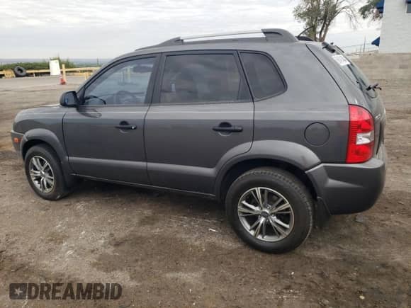 2007 Hyundai Tucson GLS z VIN KM8JM12B27U614351, wystawiony jako Copart lot #69491404 z przebiegiem 127 278 mil mil oraz Szkoda całkowita • Salvage title. Historia ofert i sprzedaży dostępna na DreamBid. Obrazek 2.