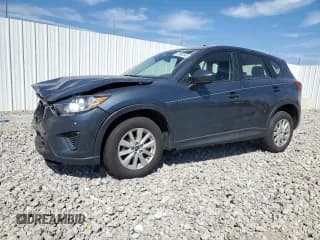✅ 2013 Mazda CX-5 Sport • VIN: JM3KE2BE5D0131419 • Лот: 81989545. Опубликован ранее на Copart с пробегом 165 374 миль. Бесплатный доступ к архиву аукционных продаж из США и подробный отчёт об истории автомобиля на DreamBid. Изображение 1.