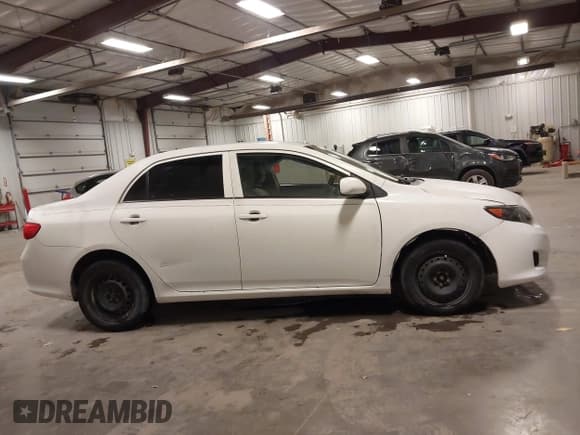 ✅ 2010 Toyota Corolla • VIN: 1NXBU4EE8AZ213695 • Лот: 43648648. Опубликован ранее на IAAI с пробегом 256 094 миль. Бесплатный доступ к архиву аукционных продаж из США и подробный отчёт об истории автомобиля на DreamBid. Изображение 13.