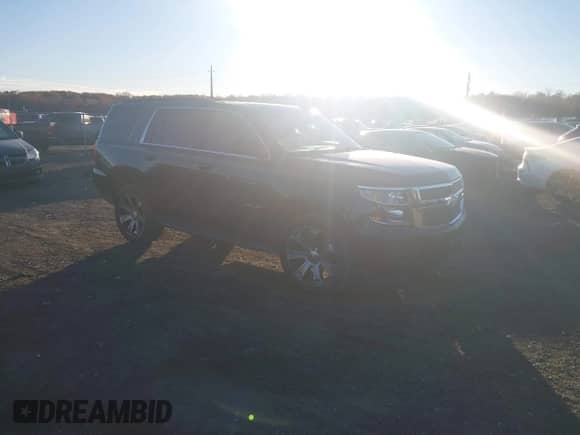 2018 Chevrolet Tahoe LT z VIN 1GNSKBKC7JR377564, wystawiony jako IAAI lot #43575752 z przebiegiem 153 789 mil mil oraz . Historia ofert i sprzedaży dostępna na DreamBid. Obrazek 1.