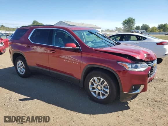 ✅ 2021 Chevrolet Traverse LT • VIN: 1GNEVHKW6MJ169289 • Lot: 70177504. Listed on Copart with 30,718 mi. Free auction sales archive from the USA and detailed vehicle history report at DreamBid. Image 4.