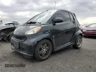 ✅ 2009 Smart fortwo Passion • VIN: WMEEK31X89K275583 • Лот: 70303305. Опубликован ранее на Copart с пробегом 114 337 миль. Бесплатный доступ к архиву аукционных продаж из США и подробный отчёт об истории автомобиля на DreamBid. Изображение 1.