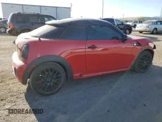 ✅ 2015 MINI Coupe S • VIN: WMWSX3C59FT409468 • Lot: 71401384. Listed on Copart with Not provided. Free auction sales archive from the USA and detailed vehicle history report at DreamBid. Image 3.