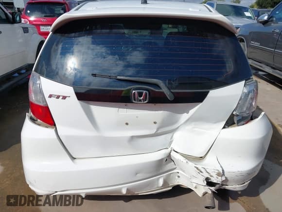 ✅ 2013 Honda Fit Sport • VIN: JHMGE8H52DC009784 • Lot: 43199569. Listed on IAAI with 206,743 mi. Free auction sales archive from the USA and detailed vehicle history report at DreamBid. Image 16.