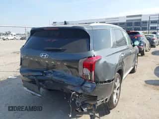 2022 Hyundai Palisade SEL z VIN KM8R44HE2NU445516, wystawiony jako IAAI lot #43196362 z przebiegiem 58 871 mil mil oraz . Historia ofert i sprzedaży dostępna na DreamBid. Obrazek 4.