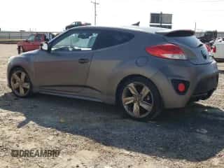 2015 Hyundai Veloster Turbo z VIN KMHTC6AE4FU221955, wystawiony jako Copart lot #68837093 z przebiegiem 103 482 mil mil oraz . Historia ofert i sprzedaży dostępna na DreamBid. Obrazek 2.