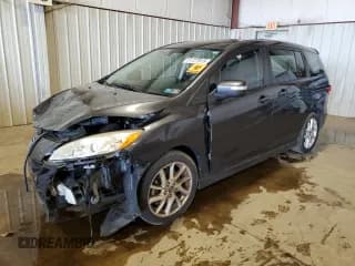 ✅ 2013 Mazda 5 Grand Touring • VIN: JM1CW2DL6D0157453 • Лот: 61727615. Опубликован ранее на Copart с пробегом Не указан. Бесплатный доступ к архиву аукционных продаж из США и подробный отчёт об истории автомобиля на DreamBid. Изображение 1.