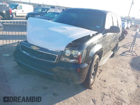 ✅ 2014 Chevrolet Tahoe Commercial • VIN: 1GNLC2E07ER222215 • Lot: 43580480. Wystawiony na IAAI z przebiegiem Nie podano. Bezpłatny archiwum sprzedaży aukcyjnych z USA i szczegółowy raport historii pojazdu na DreamBid. Zdjęcie 2.