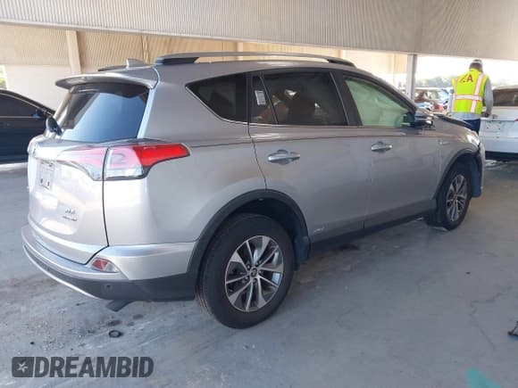 ✅ 2018 Toyota RAV4 Hybrid XLE • VIN: JTMRJREVXJD172978 • Лот: 43461828. Опубликован ранее на IAAI с пробегом 133 980 миль. Бесплатный доступ к архиву аукционных продаж из США и подробный отчёт об истории автомобиля на DreamBid. Изображение 4.