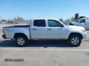 ✅ 2010 Toyota Tacoma PreRunner • VIN: 3TMJU4GN8AM092555 • Lot: 42507521. Listed on IAAI with 298,223 mi. Free auction sales archive from the USA and detailed vehicle history report at DreamBid. Image 13.