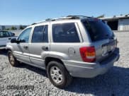 ✅ 1999 Jeep Grand Cherokee Laredo • VIN: 1J4GW58S1XC609388 • Lot: 91454555. Listed on Copart with 147,826 mi. Free auction sales archive from the USA and detailed vehicle history report at DreamBid. Image 2.