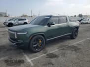 ✅ 2023 Rivian R1T Adventure • VIN: 7FCTGAAA2PN018657 • Lot: 62424785. Listed on Copart with 15,062 mi. Free auction sales archive from the USA and detailed vehicle history report at DreamBid. Image 1.