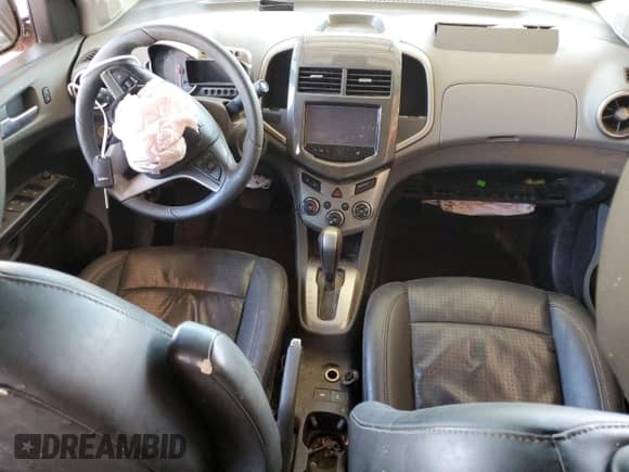 2015 Chevrolet Sonic LTZ с VIN 1G1JE5SB9F4204257, выставлен на аукционе Copart как лот 62955724 с пробегом Не указан миль и Списание • Salvage title. История ставок и продаж доступна на DreamBid. Изображение 8.