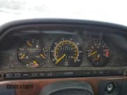 ✅ 1989 Mercedes-Benz 560 • VIN: WDBCA39E0KA469417 • Лот: 43929215. Опубликован ранее на Copart с пробегом 52 559 миль. Бесплатный доступ к архиву аукционных продаж из США и подробный отчёт об истории автомобиля на DreamBid. Изображение 9.