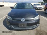 ✅ 2013 Volkswagen Jetta Hybrid • VIN: 3VW637AJ8DM229396 • Lot: 82705825. Wystawiony na Copart z przebiegiem 122 198 mil. Bezpłatny archiwum sprzedaży aukcyjnych z USA i szczegółowy raport historii pojazdu na DreamBid. Zdjęcie 5.