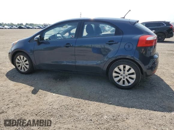 ✅ 2013 Kia Rio SX • VIN: KNADN5A33D6789995 • Lot: 67369895. Listed on Copart with 104,755 mi. Free auction sales archive from the USA and detailed vehicle history report at DreamBid. Image 2.