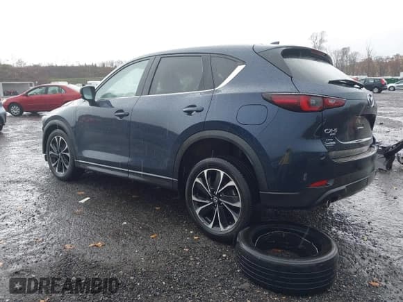✅ 2022 Mazda CX-5 S Premium • VIN: JM3KFBDM1N1548677 • Lot: 43567571. Wystawiony na IAAI z przebiegiem 44 177 mil. Bezpłatny archiwum sprzedaży aukcyjnych z USA i szczegółowy raport historii pojazdu na DreamBid. Zdjęcie 3.
