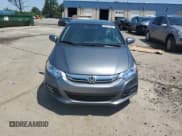 ✅ 2014 Honda Insight LX • VIN: JHMZE2H52ES000774 • Lot: 66814285. Wystawiony na Copart z przebiegiem 169 387 mil. Bezpłatny archiwum sprzedaży aukcyjnych z USA i szczegółowy raport historii pojazdu na DreamBid. Zdjęcie 5.
