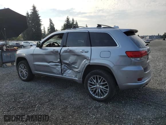 ✅ 2018 Jeep Grand Cherokee Summit • VIN: 1C4RJFJG7JC410684 • Lot: 70188035. Listed on Copart with 99,732 mi. Free auction sales archive from the USA and detailed vehicle history report at DreamBid. Image 2.