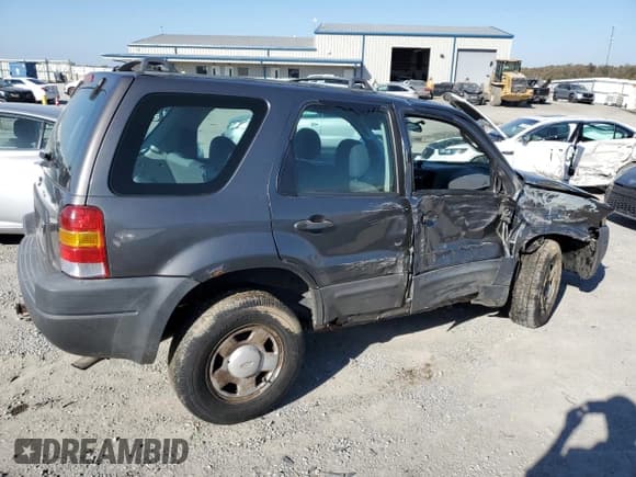 ✅ 2003 Ford Escape XLS Popular • VIN: 1FMYU921X3KB87480 • Lot: 91208065. Listed on Copart with 180,153 mi. Free auction sales archive from the USA and detailed vehicle history report at DreamBid. Image 3.