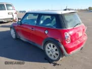 ✅ 2006 MINI Hardtop S • VIN: WMWRE335X6TN25797 • Lot: 43670013. Listed on IAAI with 92,415 mi. Free auction sales archive from the USA and detailed vehicle history report at DreamBid. Image 3.