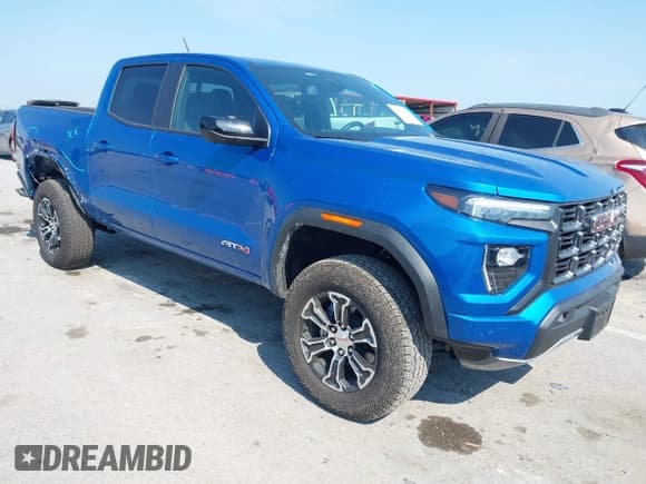 ✅ 2024 GMC Canyon 4WD AT4 • VIN: 1GTP6DEK3R1210386 • Лот: 42980479. Опубликован ранее на IAAI с пробегом 11 917 миль. Бесплатный доступ к архиву аукционных продаж из США и подробный отчёт об истории автомобиля на DreamBid. Изображение 1.
