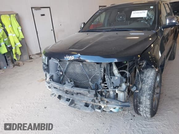 ✅ 2014 Jeep Grand Cherokee Overland • VIN: 1C4RJFCT1EC409613 • Lot: 43415659. Listed on IAAI with 173,712 mi. Free auction sales archive from the USA and detailed vehicle history report at DreamBid. Image 6.