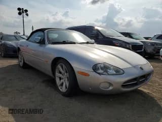 ✅ 2003 Jaguar XK • VIN: SAJDA42C232A32233 • Лот: 76236974. Опубликован ранее на Copart с пробегом Не указан. Бесплатный доступ к архиву аукционных продаж из США и подробный отчёт об истории автомобиля на DreamBid. Изображение 4.