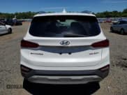 ✅ 2020 Hyundai Santa Fe Limited • VIN: 5NMS5CAA9LH261179 • Lot: 60977274. Wystawiony na Copart z przebiegiem 23 132 mil. Bezpłatny archiwum sprzedaży aukcyjnych z USA i szczegółowy raport historii pojazdu na DreamBid. Zdjęcie 6.