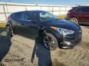 ✅ 2014 Hyundai Veloster Turbo • VIN: KMHTC6AE9EU199062 • Lot: 89151635. Wystawiony na Copart z przebiegiem 100 606 mil. Bezpłatny archiwum sprzedaży aukcyjnych z USA i szczegółowy raport historii pojazdu na DreamBid. Zdjęcie 4.