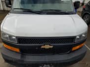 ✅ 2018 Chevrolet Express Cargo • VIN: 1GCWGBFP1J1340565 • Lot: 82257055. Listed on Copart with 228,369 mi. Free auction sales archive from the USA and detailed vehicle history report at DreamBid. Image 12.