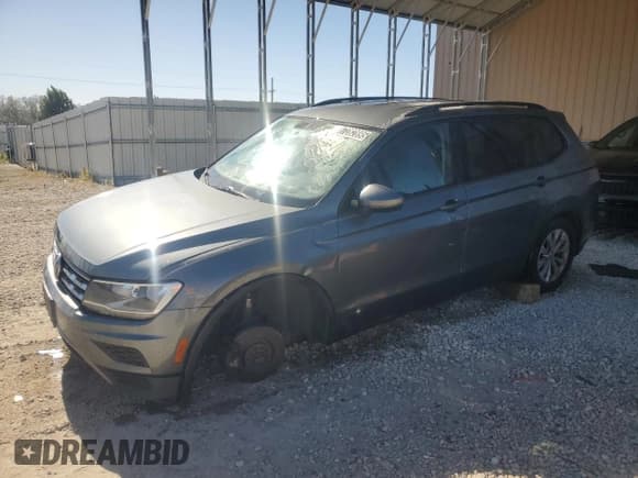 ✅ 2018 Volkswagen Tiguan S • VIN: 3VV1B7AX0JM108976 • Lot: 87282895. Listed on Copart with 187,697 mi. Free auction sales archive from the USA and detailed vehicle history report at DreamBid. Image 1.