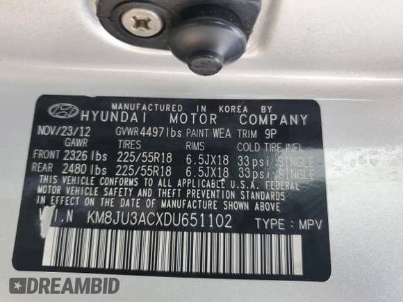 2013 Hyundai Tucson GLS z VIN KM8JU3ACXDU651102, wystawiony jako Copart lot #65889525 z przebiegiem 220 214 mil mil oraz Szkoda całkowita • Salvage title. Historia ofert i sprzedaży dostępna na DreamBid. Obrazek 13.