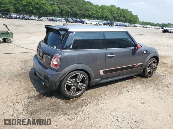 2013 MINI Hardtop John Cooper Works с VIN WMWSU9C53DT722265, выставлен на аукционе Copart как лот 59310535 с пробегом 129 589 миль миль и Списание • Salvage title. История ставок и продаж доступна на DreamBid. Изображение 3.