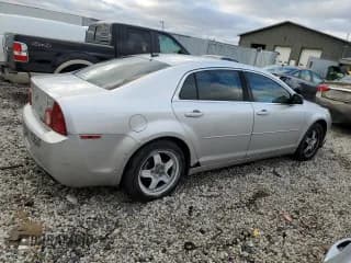 ✅ 2010 Chevrolet Malibu 1LS • VIN: 1G1ZB5EB2A4100371 • Lot: 80350734. Listed on Copart with 141,895 mi. Free auction sales archive from the USA and detailed vehicle history report at DreamBid. Image 3.