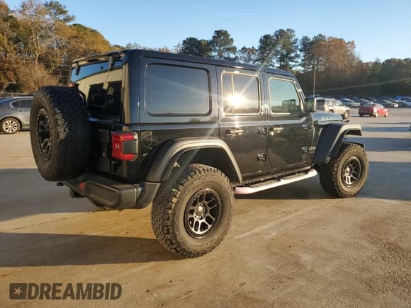 ✅ 2022 Jeep Wrangler Unlimited High Tide • VIN: 1C4HJXDG0NW247152 • Lot: 82371674. Listed on Copart with 32,417 mi. Free auction sales archive from the USA and detailed vehicle history report at DreamBid. Image 3.