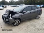 ✅ 2017 Ford Fiesta Titanium • VIN: 3FADP4CJ4HM123260 • Lot: 46355095. Wystawiony na Copart z przebiegiem 69 398 mil. Bezpłatny archiwum sprzedaży aukcyjnych z USA i szczegółowy raport historii pojazdu na DreamBid. Zdjęcie 1.