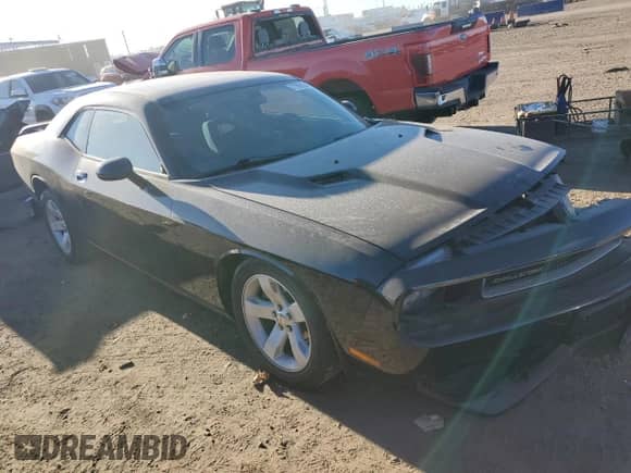 2012 Dodge Challenger SXT z VIN 2C3CDYAG5CH158155, wystawiony jako Copart lot #71998244 z przebiegiem 63 416 mil mil oraz Szkoda całkowita • Salvage title. Historia ofert i sprzedaży dostępna na DreamBid. Obrazek 4.
