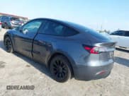 ✅ 2023 Tesla Model Y Long Range • VIN: 7SAYGDEE5PA099226 • Lot: 42004061. Listed on IAAI with 10,607 mi. Free auction sales archive from the USA and detailed vehicle history report at DreamBid. Image 3.