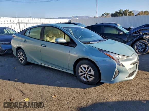 ✅ 2017 Toyota Prius Two • VIN: JTDKBRFU3H3042870 • Lot: 94104135. Listed on Copart with 90,689 mi. Free auction sales archive from the USA and detailed vehicle history report at DreamBid. Image 4.