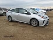 ✅ 2021 Toyota Prius L Eco • VIN: JTDKAMFU7M3148299 • Лот: 86177145. Опубликован ранее на Copart с пробегом 96 714 миль. Бесплатный доступ к архиву аукционных продаж из США и подробный отчёт об истории автомобиля на DreamBid. Изображение 4.