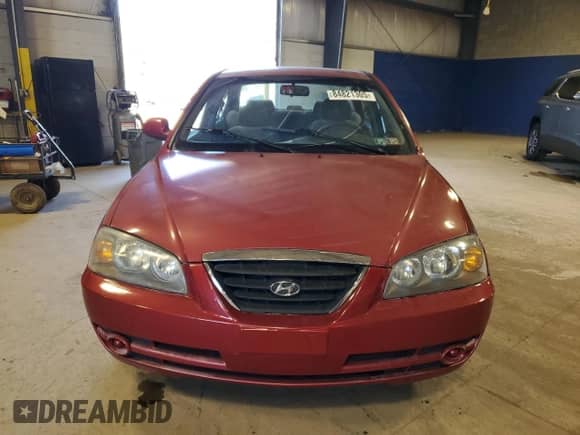 2006 Hyundai Elantra GLS with VIN KMHDN46D16U324883, listed as a Copart auction lot 84821305 with 59,301 mi miles and Salvage title. Bid and sale history available at DreamBid. Image 5.